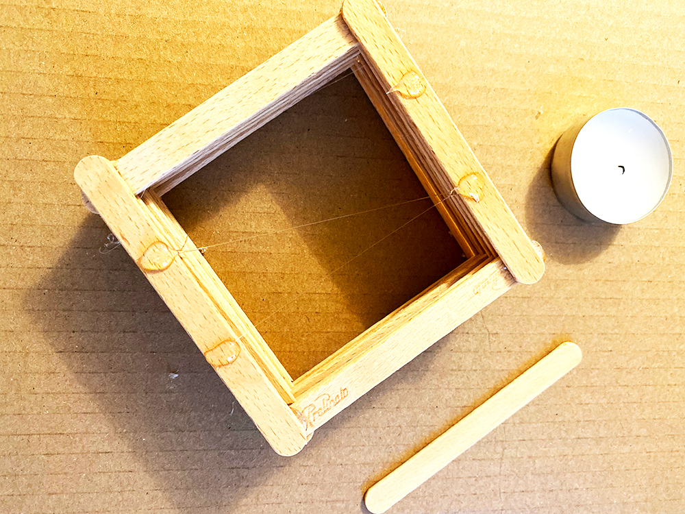 Photo of making of Popsicle stick candle holder